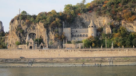 Ancient buildings on the riverfront while sailing into Budapest.