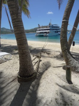 Ship tied up to a coconut tree at Blue Lagoon.