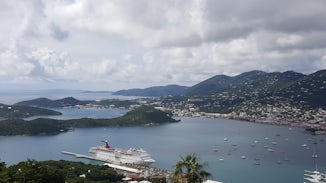 Take the cable car in St Thomas. Excellent views and cheap drinks at the to