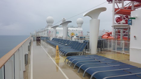 Top deck.  Plenty of seats available on rainy days!