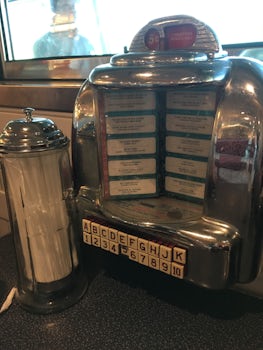 The non working, but cool little juke boxes in Johnny Rockets.