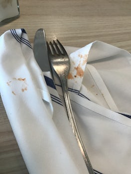 Was lucky enough to get utensils dirty with sauce wrapped in my napkin. How can someone look on a sauce covered fork/knife and wrap it in a napkin?!