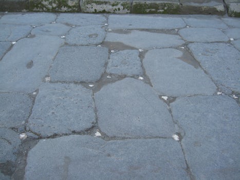 Pompeii---Little white rocks in street were to illuminate street under torc