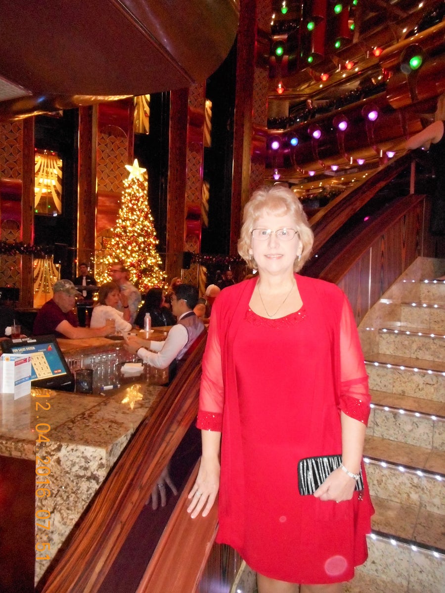 This was formal night on the Carnival Freedom, with the ship all decked out for Christmas.  I was really excited to have a pretty red dress to go to dinner with my husband Chris. He