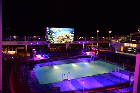 outdoor television and movie area by the pool