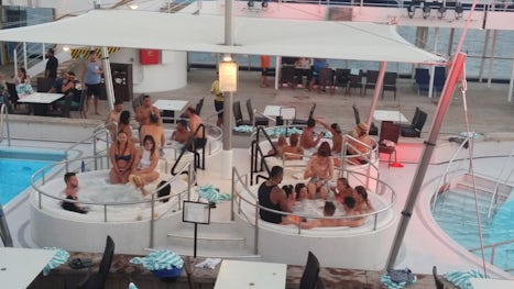 Whirlpools/Jacuzzi's Mid-Ship on Deck 10 packed with partiers.