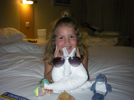 My granddaughter with her armadillo towel animal!