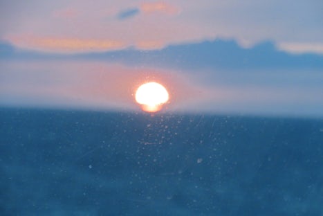 The sun setting on the Atlantic Ocean.