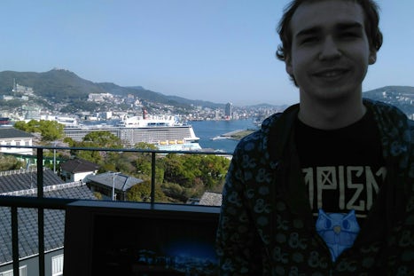 Bobby posing above the port of Nagasaki at Glover Garden.    "Dude, tha