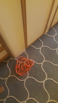 Extension cord provided - since outlet and vanity under the smoke detector,