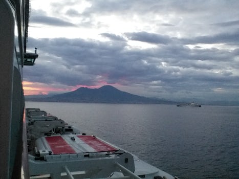 Sun coming up behind mount Vesuvius
