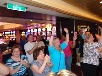 Cruise Critic group celebrating after the wheel landed on  $1,000.