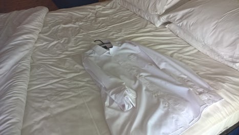 White shirt showing yellow stained sheets