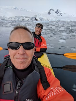 Kayaking Antarctica.  It was warm enough this day for no hat and no gloves.