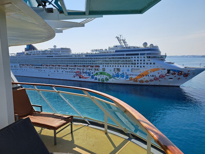 Wraparound balcony viewing the Norwegian Pearl join us in Bermuda.