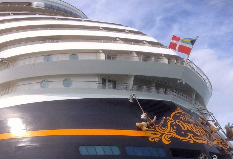 Exterior shot of the after of the ship, and The Tiny Dancer cabin on Disney Cruise Line