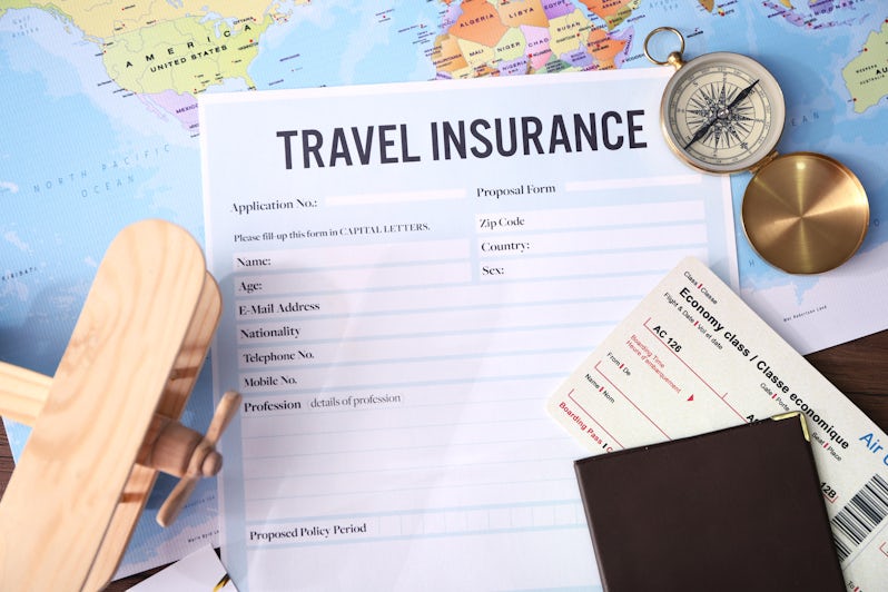 Travel Insurance Document (Photo: Africa Studio/Shutterstock)
