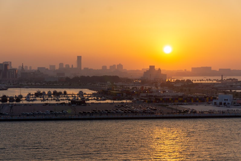 Sunset departure from Doha, Qatar aboard MSC World Europa (Photo: Aaron Saunders)