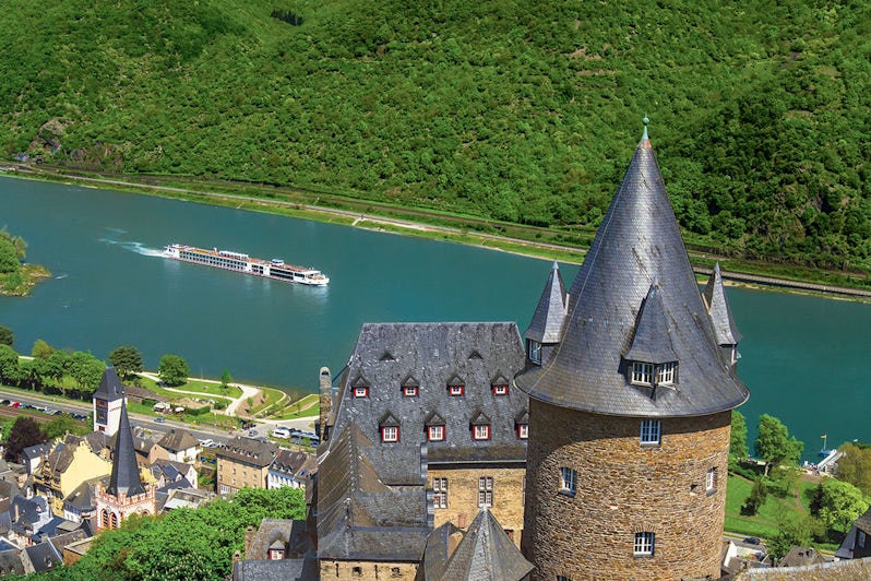 Viking Longships sail past Bacharach Stahleck Castle on the Rhine