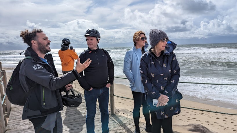 Cyclists learn about sand dunes and their importance to the region in Portugal during a tour from Avalon Alegria. (Photo: Colleen McDaniel)