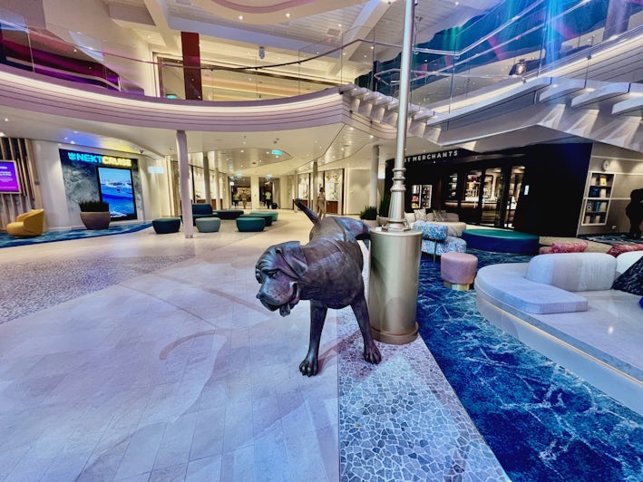 Dog statue in the Royal Promenade on Icon of the Seas (Photo: Chris Gray Faust)