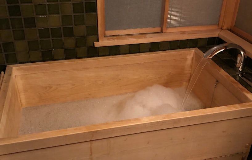 A traditional Japanese wooden bathtub