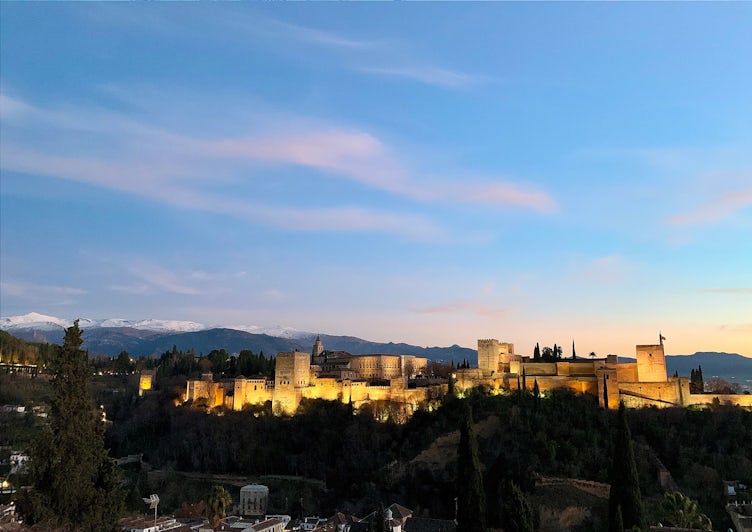 Dusk over the Alhambra from the Albaycin neighborhood in Granada, Spain