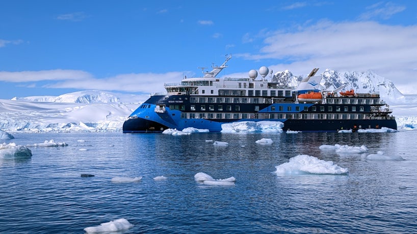 Ocean Victory sits among icebergs in Antarctica. (Photo: John Roberts)