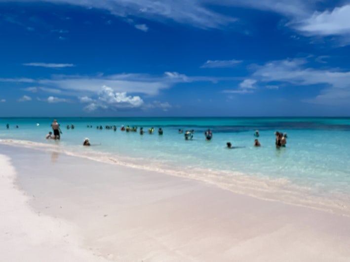 Beach goers at Family Beach, Lookout Cay at Lighthouse Point (Photo: Chris Gray Faust)