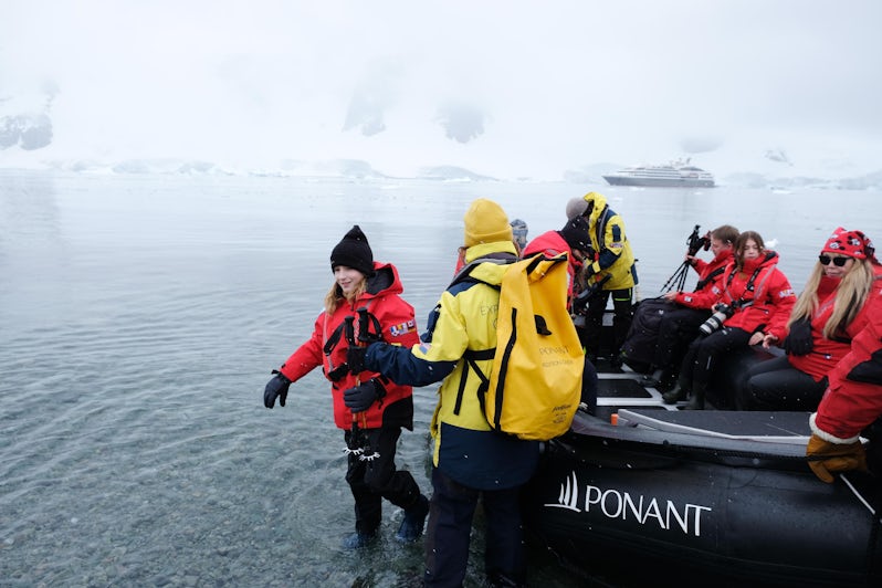 August exiting the Zodiac during a wet landing in Antarctica (Photo: Cynthia Drake)