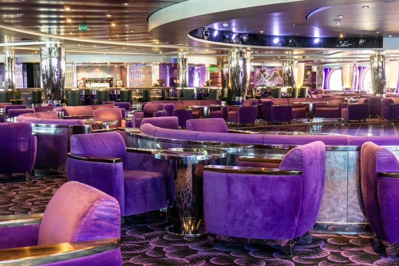 The L'Ametista Lounge aboard MSC Magnifica is done in hues of purple and magenta (Photo: Aaron Saunders)