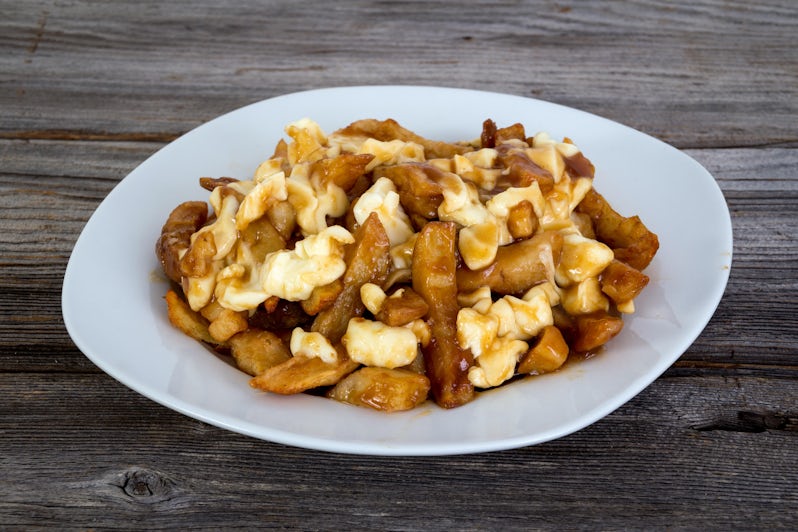 Quebec's Delicacy Poutine Which is Gravy and Fries (Photo: julie deshaies/Shutterstock)