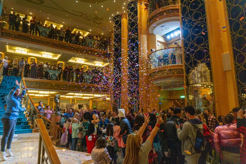 Celebrations are held frequently in the atrium aboard Disney Wonder and are great fun for all ages (Photo: Aaron Saunders)