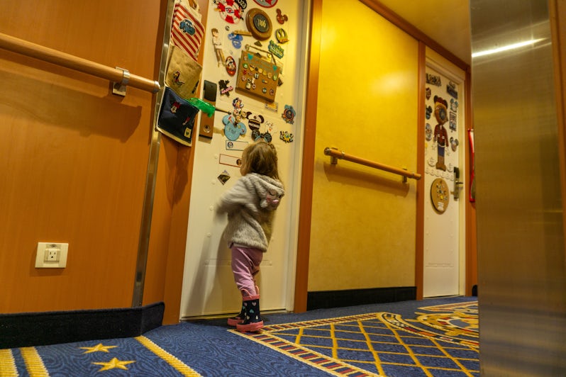 Touring the door decorations on Disney Wonder became an event in itself for our daughter (Photo: Aaron Saunders)