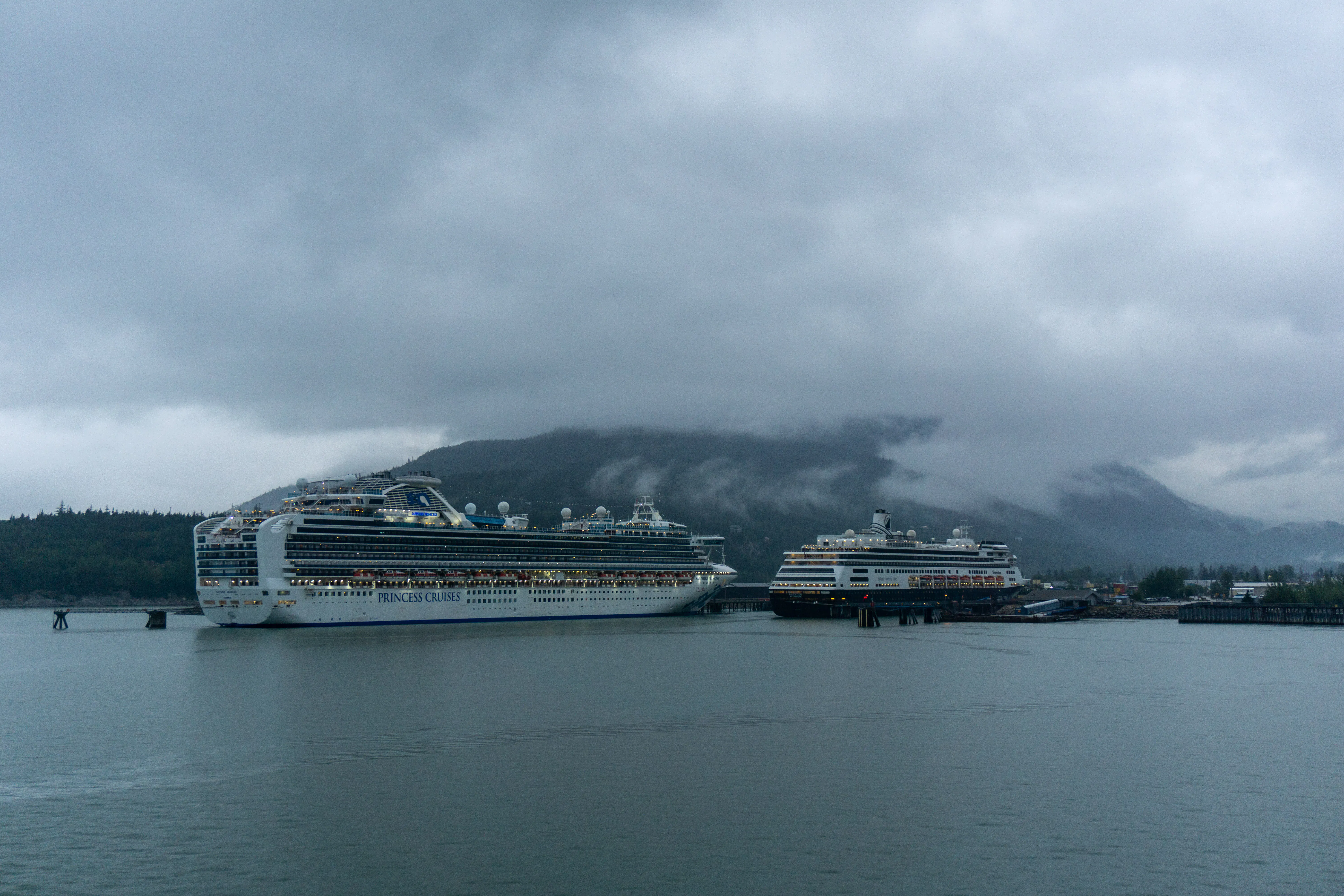 Sapphire Princess and Holland America's Volendam in Skagway, Alaska at dusk (Photo: Aaron Saunders)