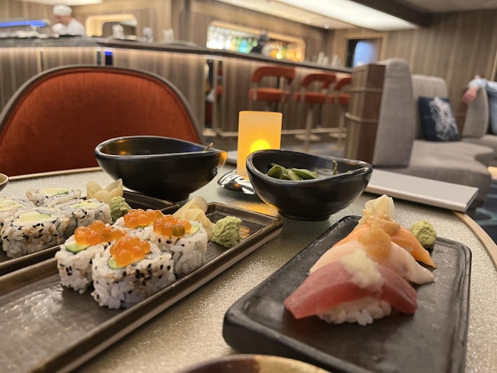 Enjoying sushi in The Club aboard Seabourn Venture (Photo: Chris Gray Faust)