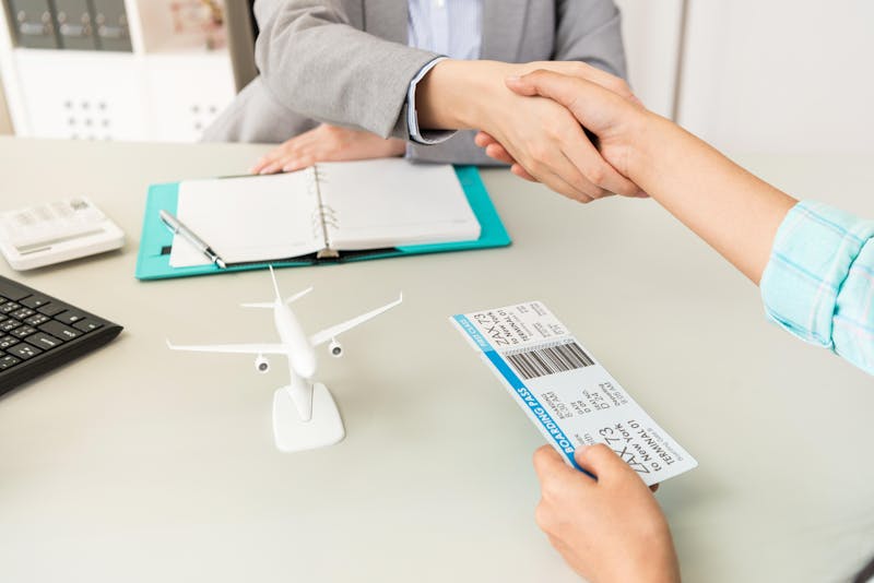 Travel Agent Assisting a Client with Booking a Luxury Cruise