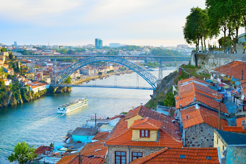 Cruise ship arrives to Porto by the river Douro, Portugal