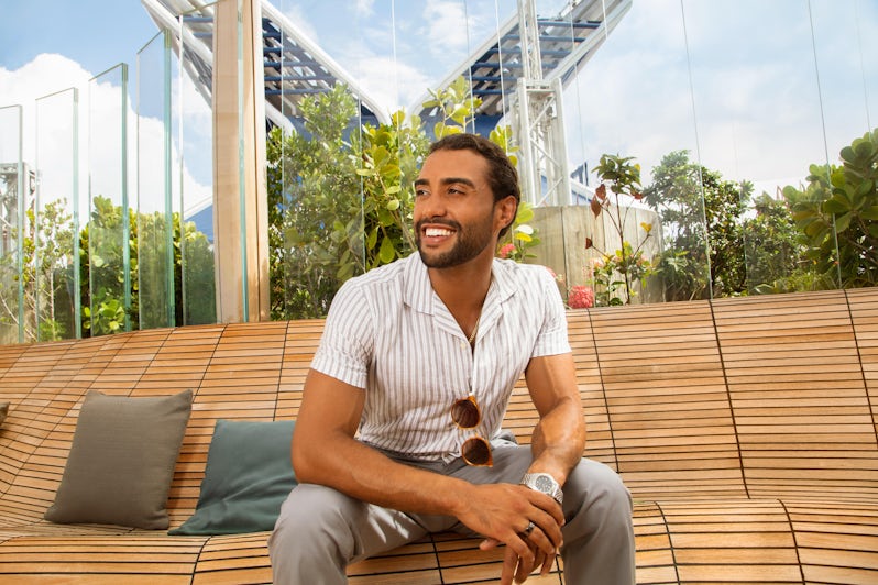 Joshua Reyes, a former Marine Corps sergeant who overcame paraplegia, at the Rooftop Garden on Celebrity Edge. (Photo: Naima Green/AIPP)