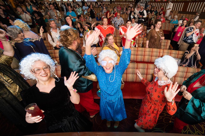 Fans partying in the theater on the Golden Fans at Sea 2020 cruise