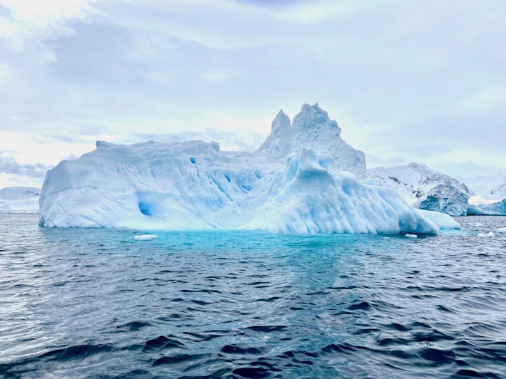 Turquoise iceberg in Antarctica on Atlas Ocean Voyages' World Traveller cruise (Photo/Gwen Pratesi)
