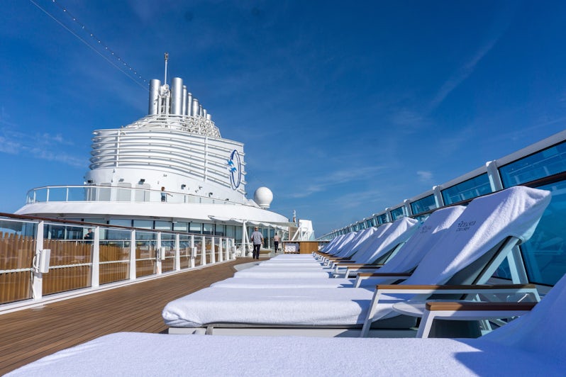 Plush loungers adorn the upper pool deck aboard Oceania's Vista (Photo: Aaron Saunders)