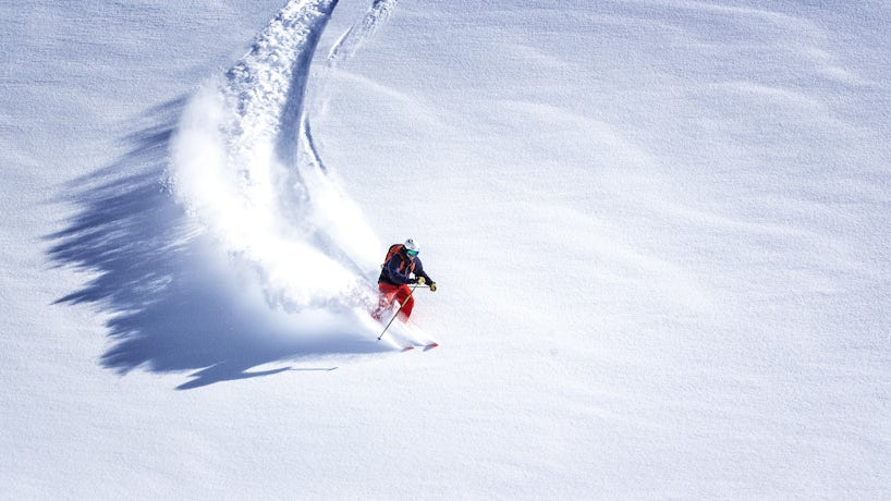 Skier Skiing Down Hill (Photo: MWiklik/Shutterstock)