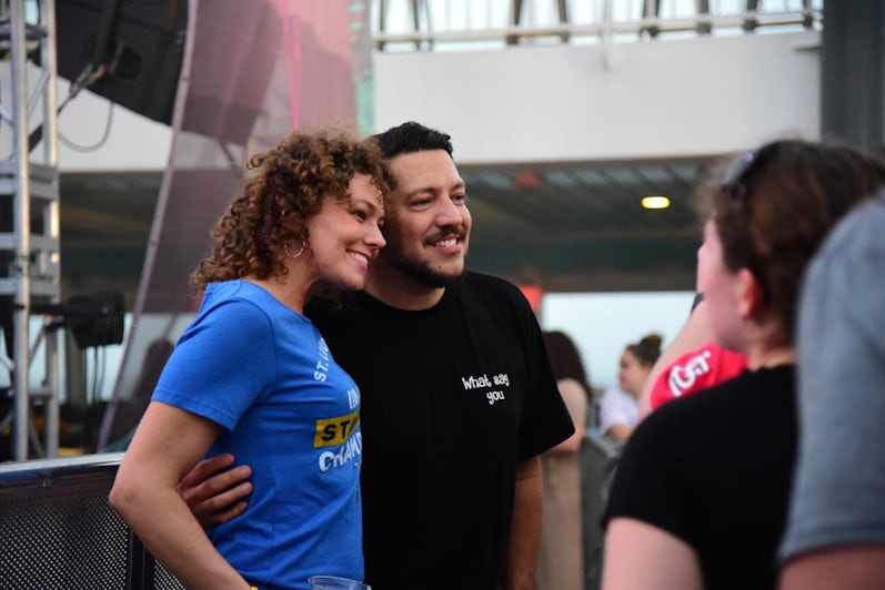 Sal Vulcano posing for a photo with a fan