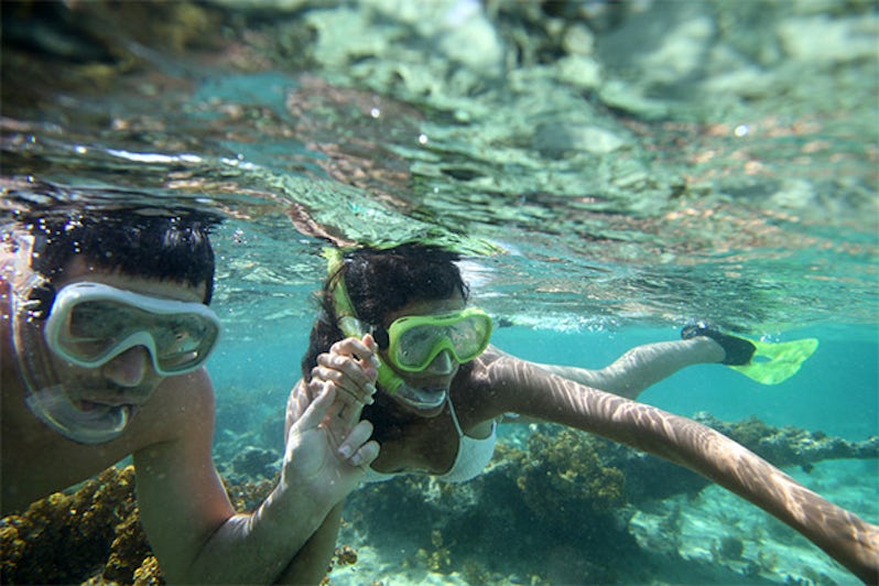 Couple snorkeling in the Caribbean
