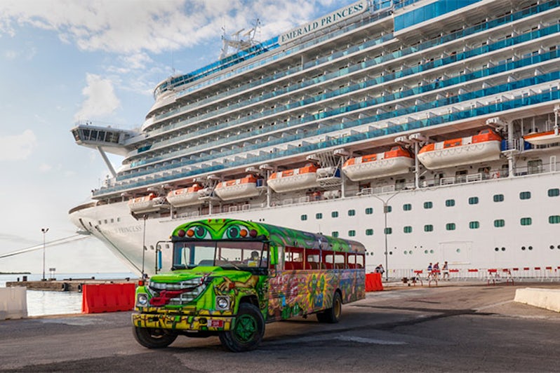 A colorful tour bus in Oranjestad