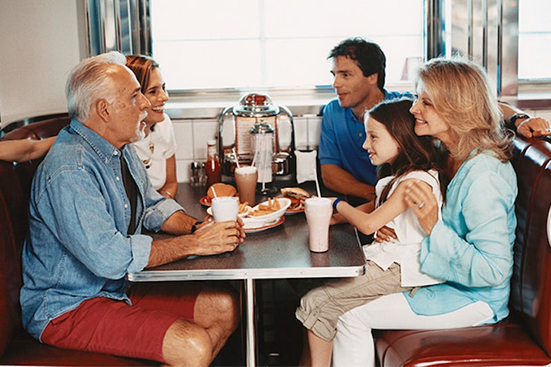 Multi-generational family dining at Johnny Rockets on Freedom of the Seas