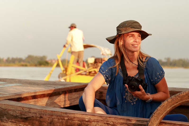 woman on an irrawaddy river boat