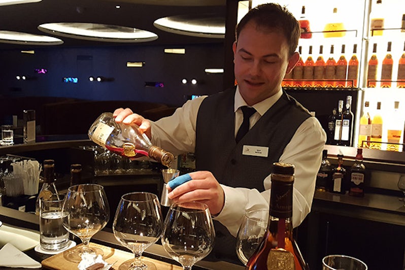 bartender serving brandy