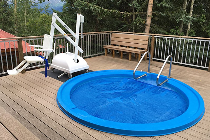 The ADA-compliant hot tub at the Princess Wilderness Lodge with a chair lift
